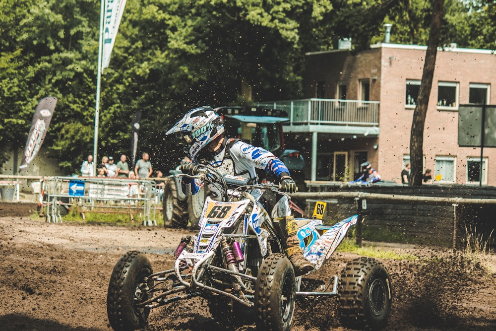 time lapse photography of man riding ATV