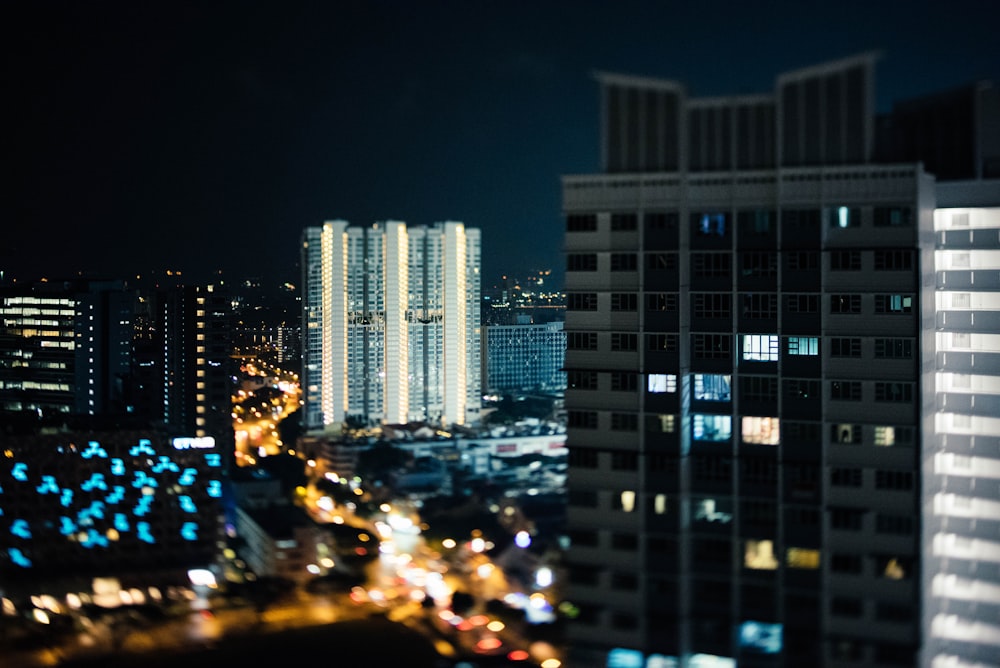 lighted high-rise buildings at night