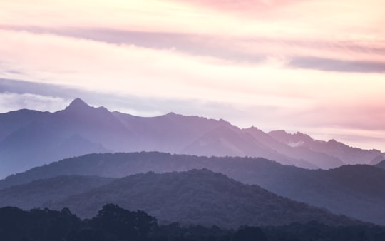 clouds over mountains in Fiordland New Zealand