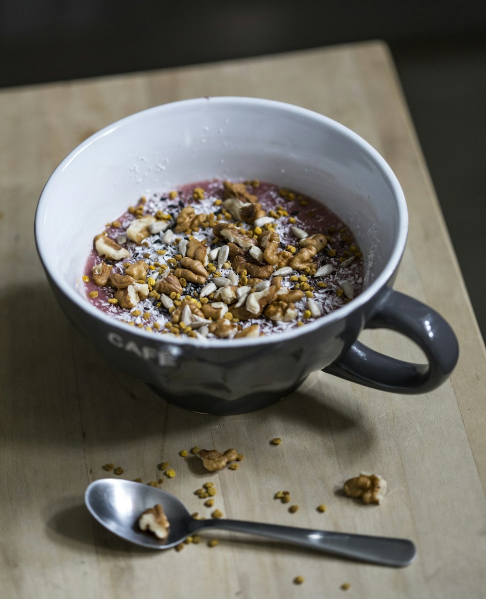 mug with cereal on table