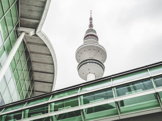 white and red tower under blue sky during daytime in Heinrich-Hertz-Turm Germany