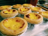 Traditional Portuguese custard tarts arranged neatly.