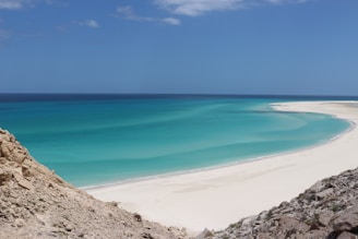 landscape photo of seashore under blue sky
