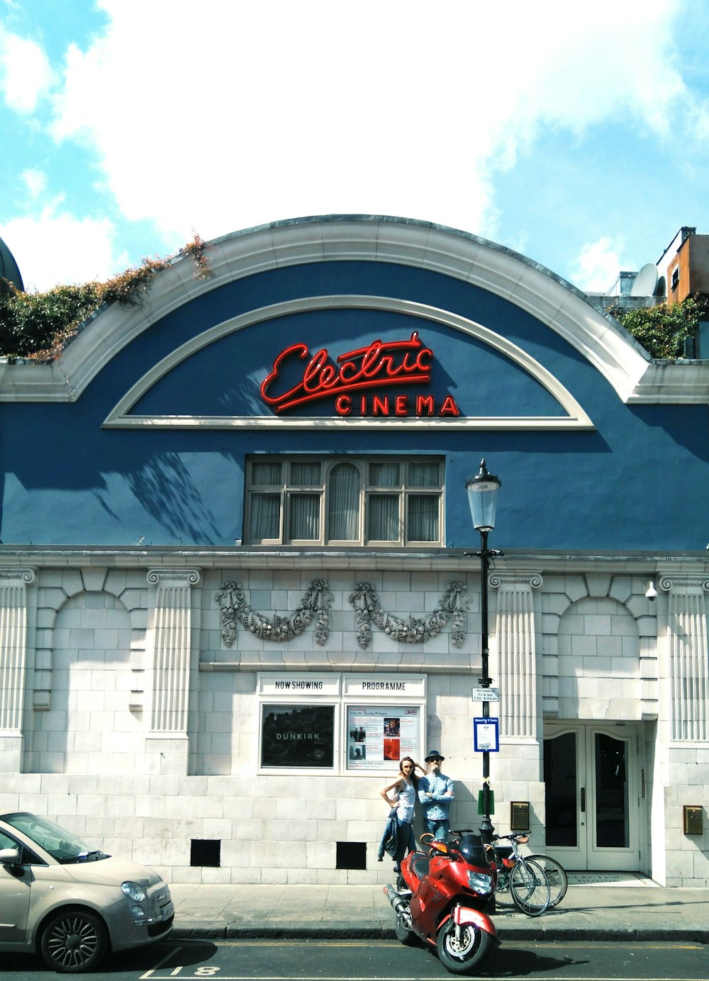 two person standing in front of Electric Cinema building