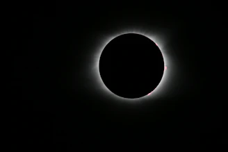 Close-up of the eclipse’s corona shimmering against a deep twilight sky.