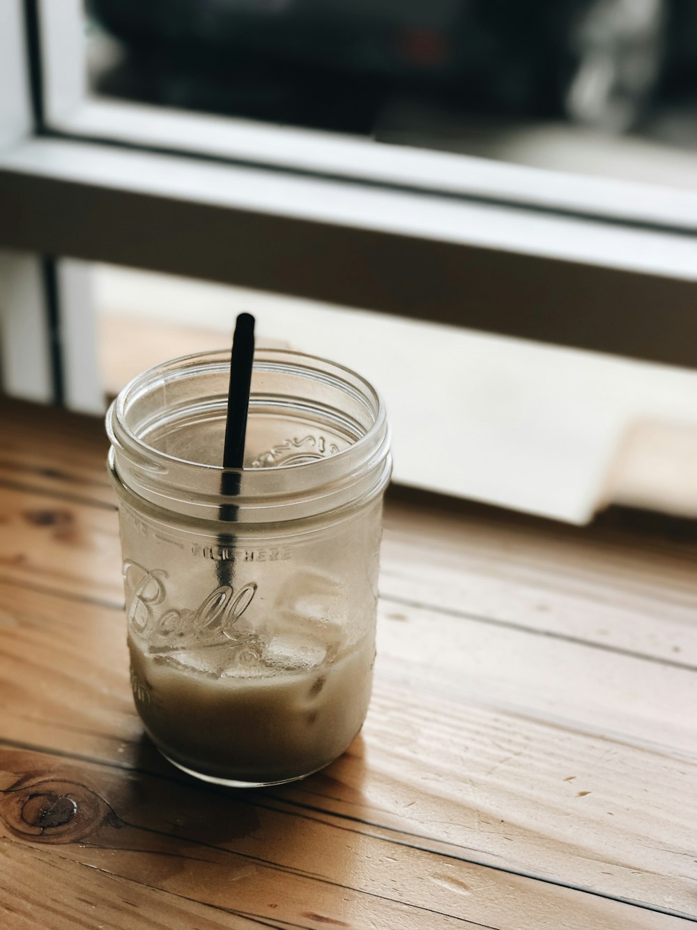 selective focus photography of Mason jar