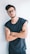 man wearing eyeglasses and sleeveless top
