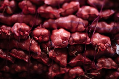Stacks of neatly packed polyacrylamide bags ready for shipment.