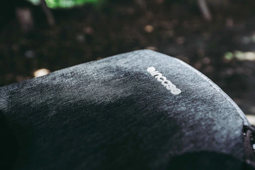 Close-up of the flap-jacket® fabric texture highlighting durable stitching and tactical design.