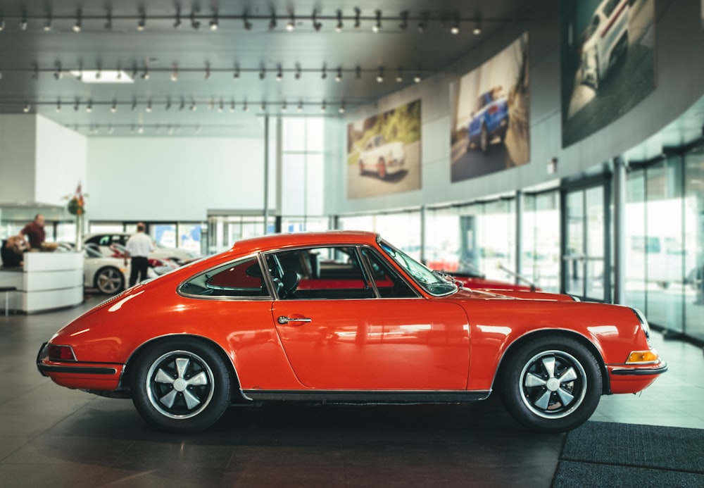 parked coupe inside building