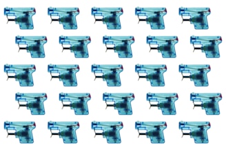 A grid pattern of multiple blue and transparent toy guns, each showing internal mechanics, arranged symmetrically on a white background.