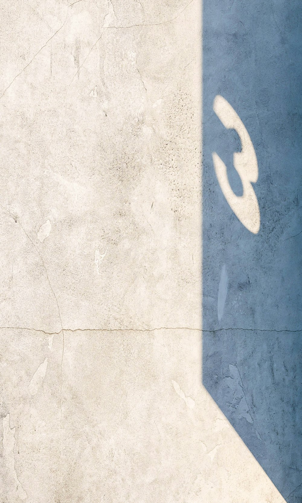 a man riding a skateboard on top of a cement floor