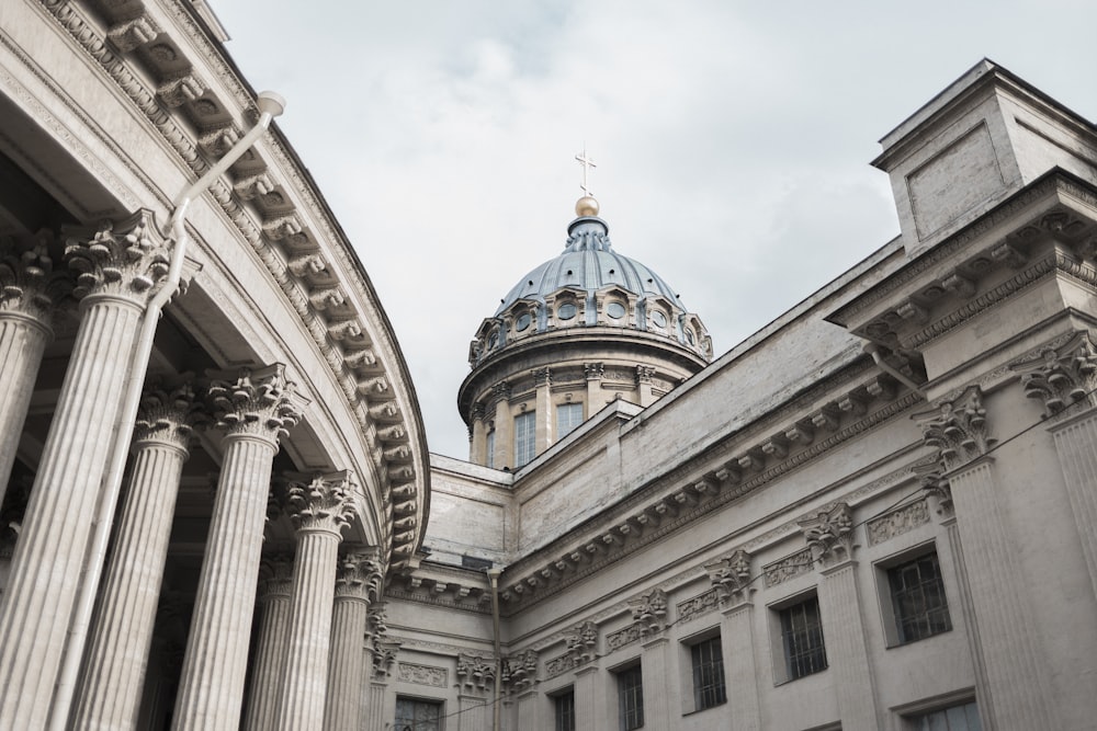 low-angle photography of gray and white dome concrete building