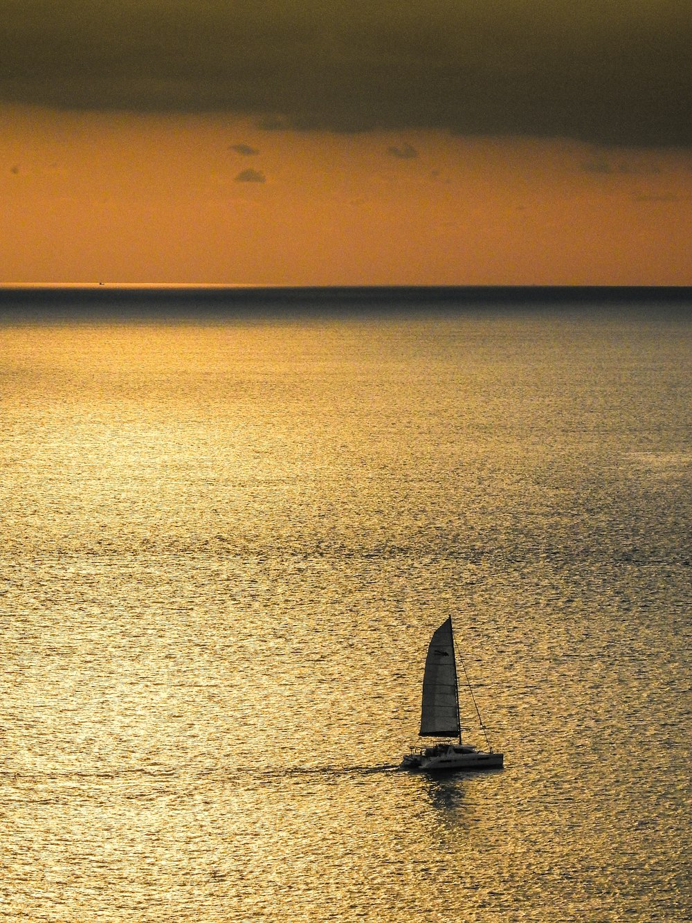 sailboat on body of water