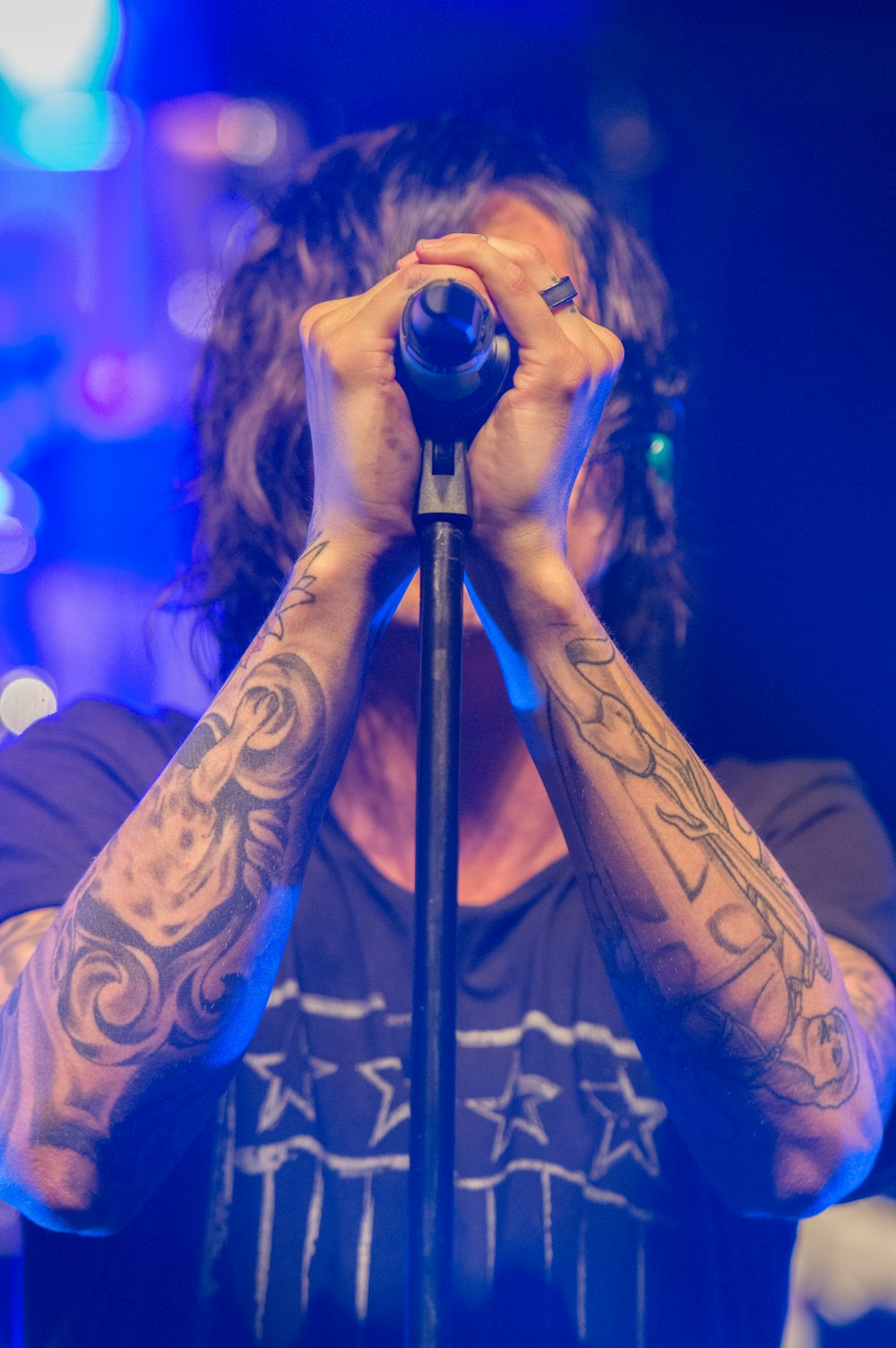 man holding black microphone