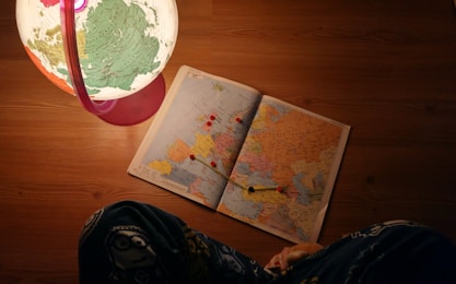 World map and globe used for travel planning