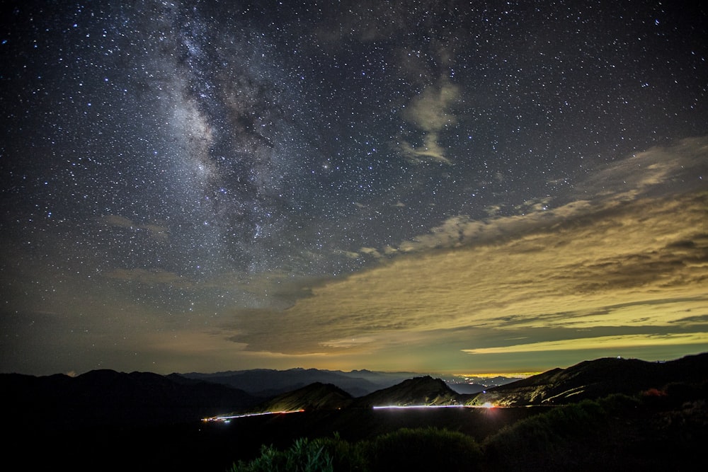 mountain range under Milky Way galaxy