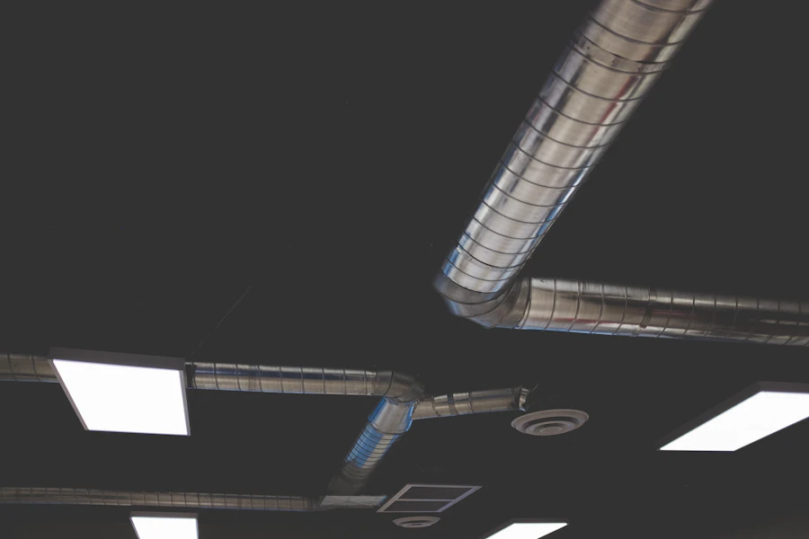 Spiral metal air ducts running across a building ceiling in Las Vegas, NV