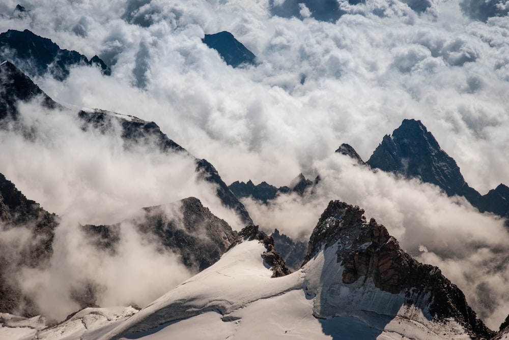 aerial view of mountains covered with clouds