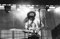 man playing electric guitar