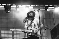 man playing electric guitar