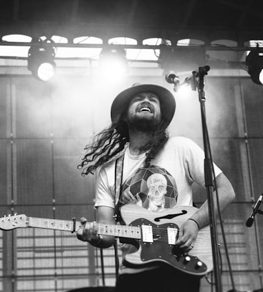 man playing electric guitar