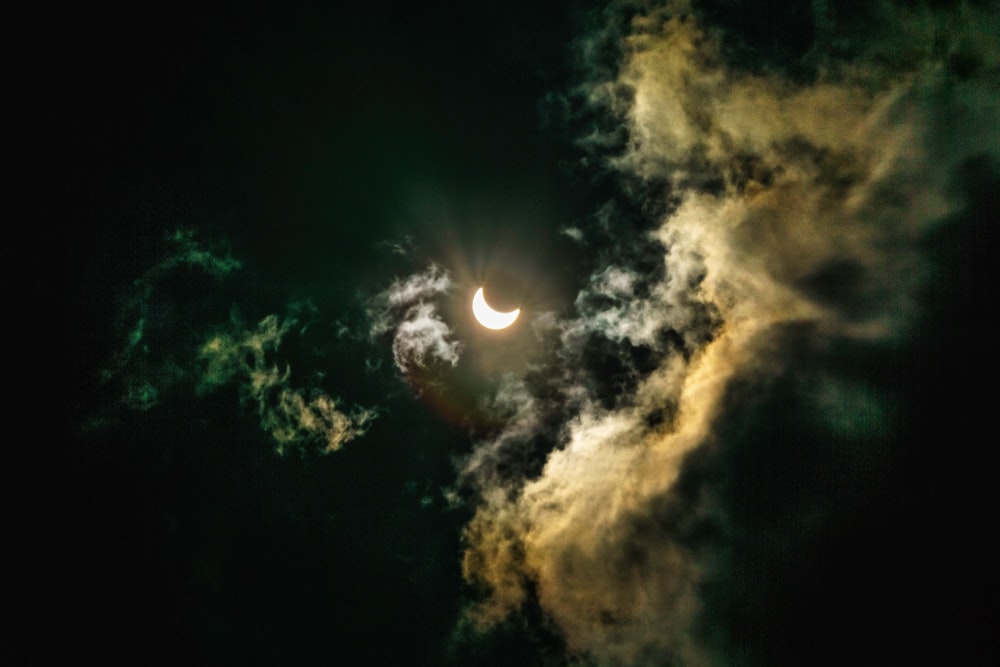 crescent moon and clouds