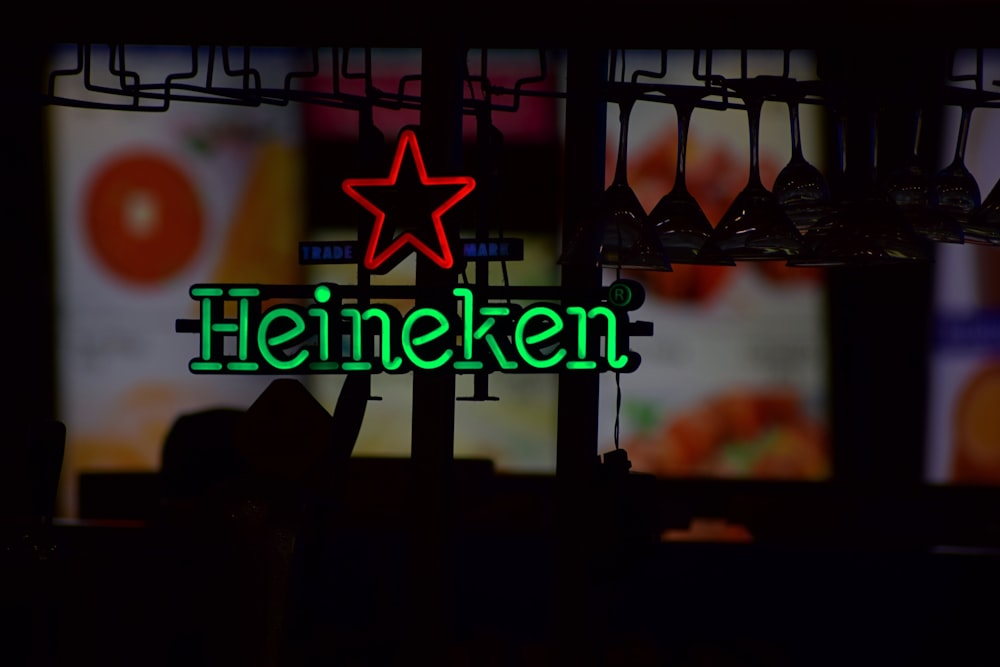 red and green Heineken neon sign is lit