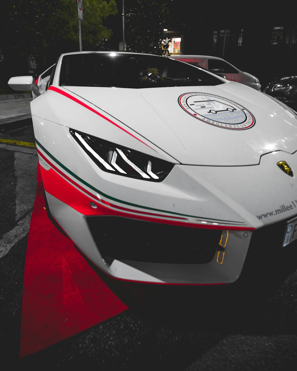 A parked white sports car.