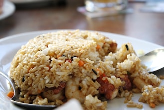 A close-up photo of a plate of special fried rice with vibrant colors and fresh ingredients.