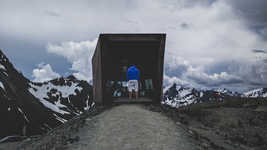 man standing on mountain in Tyrol Austria