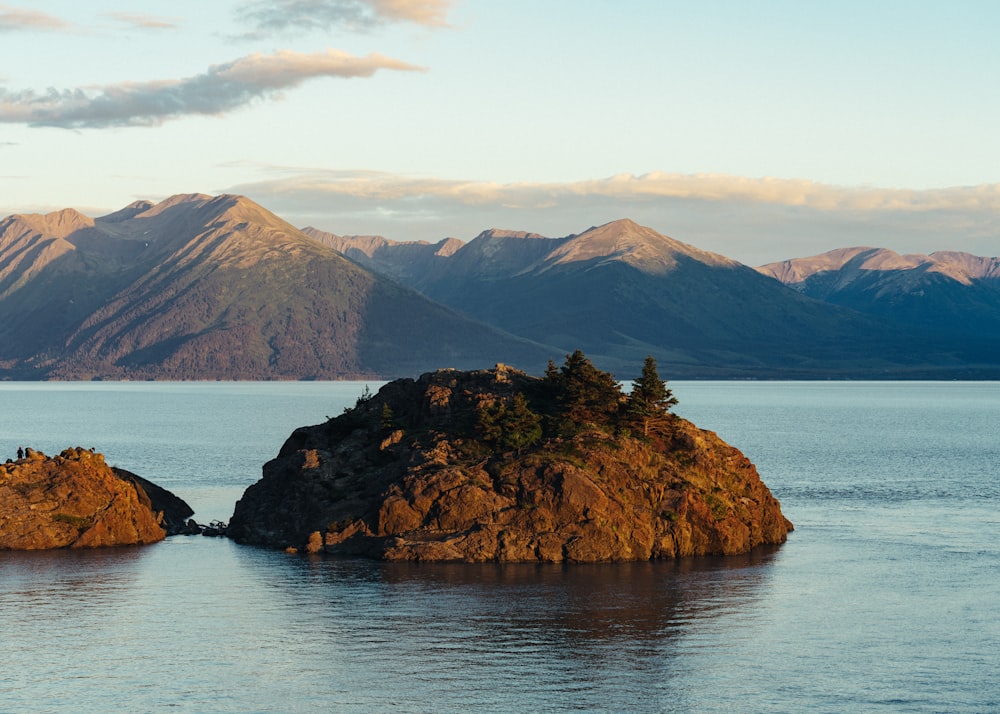 brown island near mountains