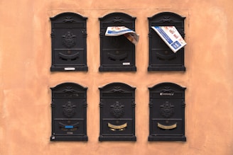 six black wooden frames