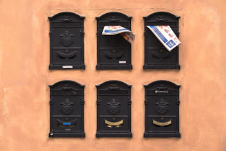 six black wooden frames