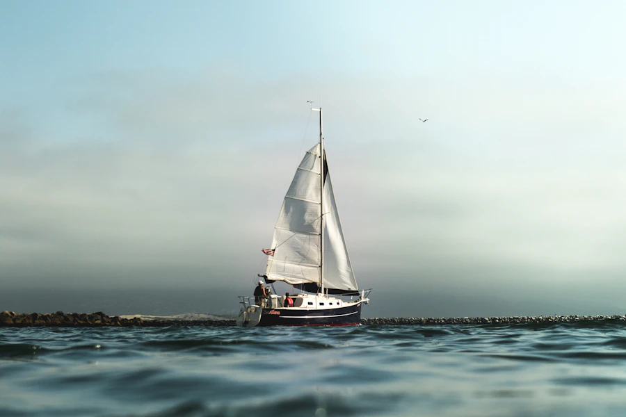 Sailing yacht on calm blue water