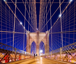 Brooklyn Bridge under blue sky
