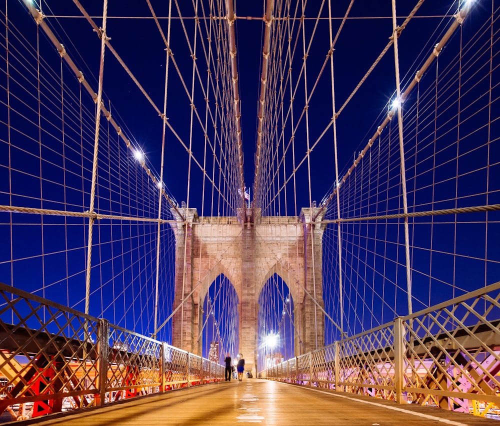 Brooklyn Bridge under blue sky