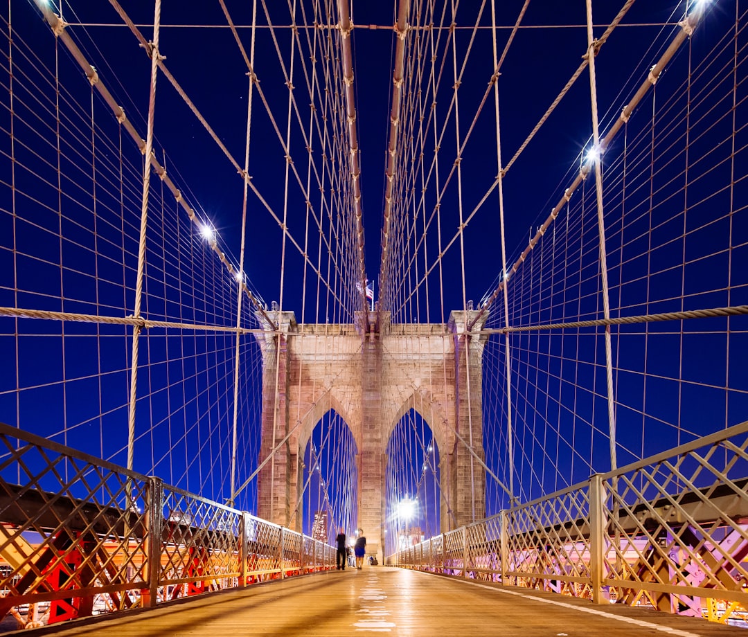 Brooklyn Bridge under blue sky