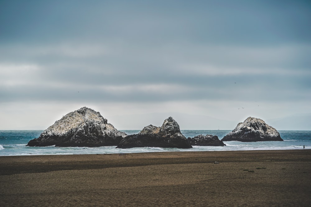 mountains on body of water