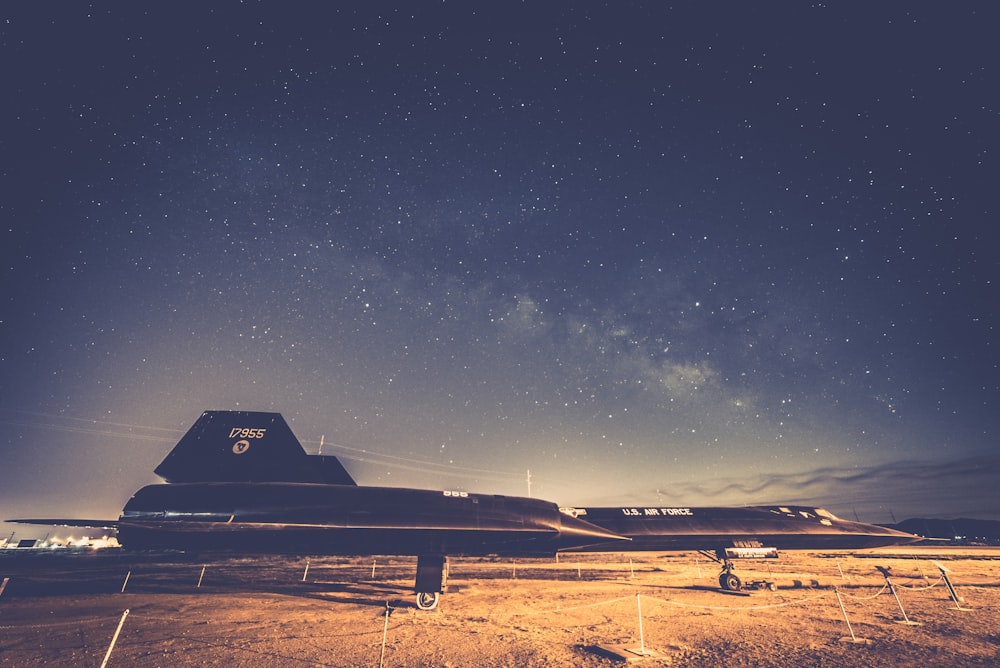 black U.S. Air Force jet plane parked on ground