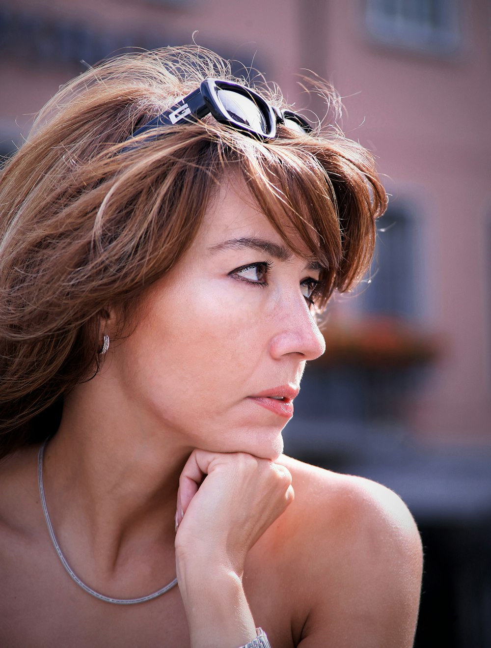 a woman with a pair of goggles on her head