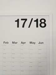 A minimalistic wall calendar displaying months from February to June with bold, black numbers '17/18' at the top.