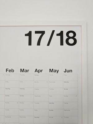 A minimalistic wall calendar displaying months from February to June with bold, black numbers '17/18' at the top.