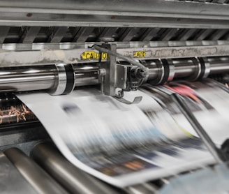 wide view of 4 color printing press