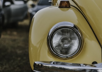 photo of yellow Volkswagen Beetle