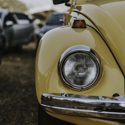 photo of yellow Volkswagen Beetle