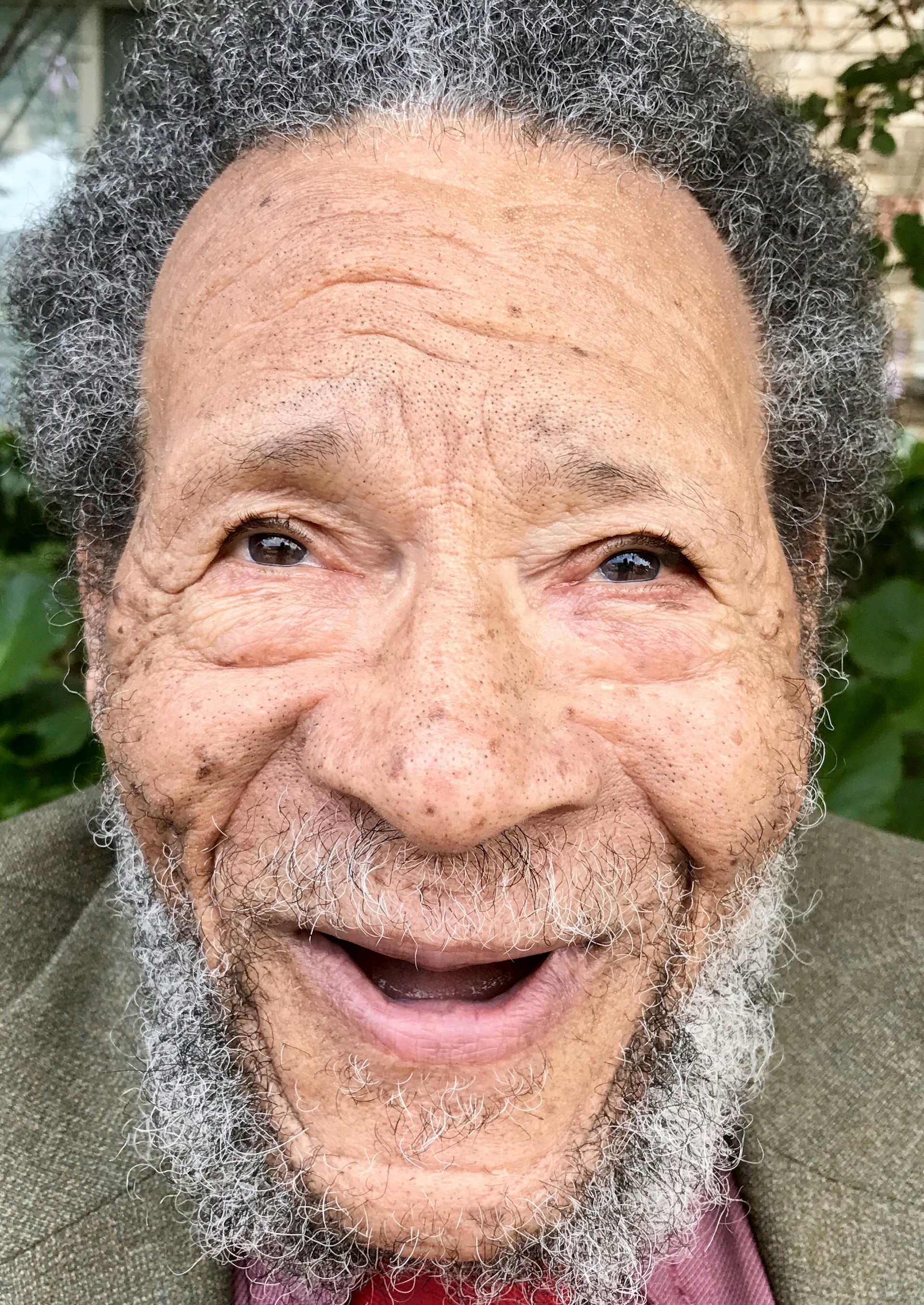 black and brown leather padded tub sofa