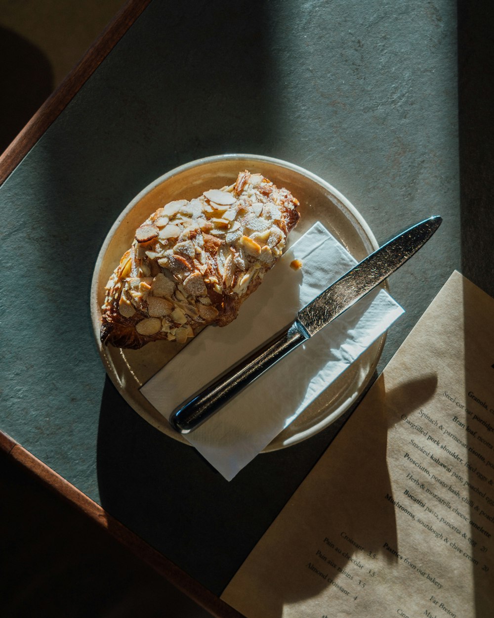 stainless steel knife on ceramic bowl