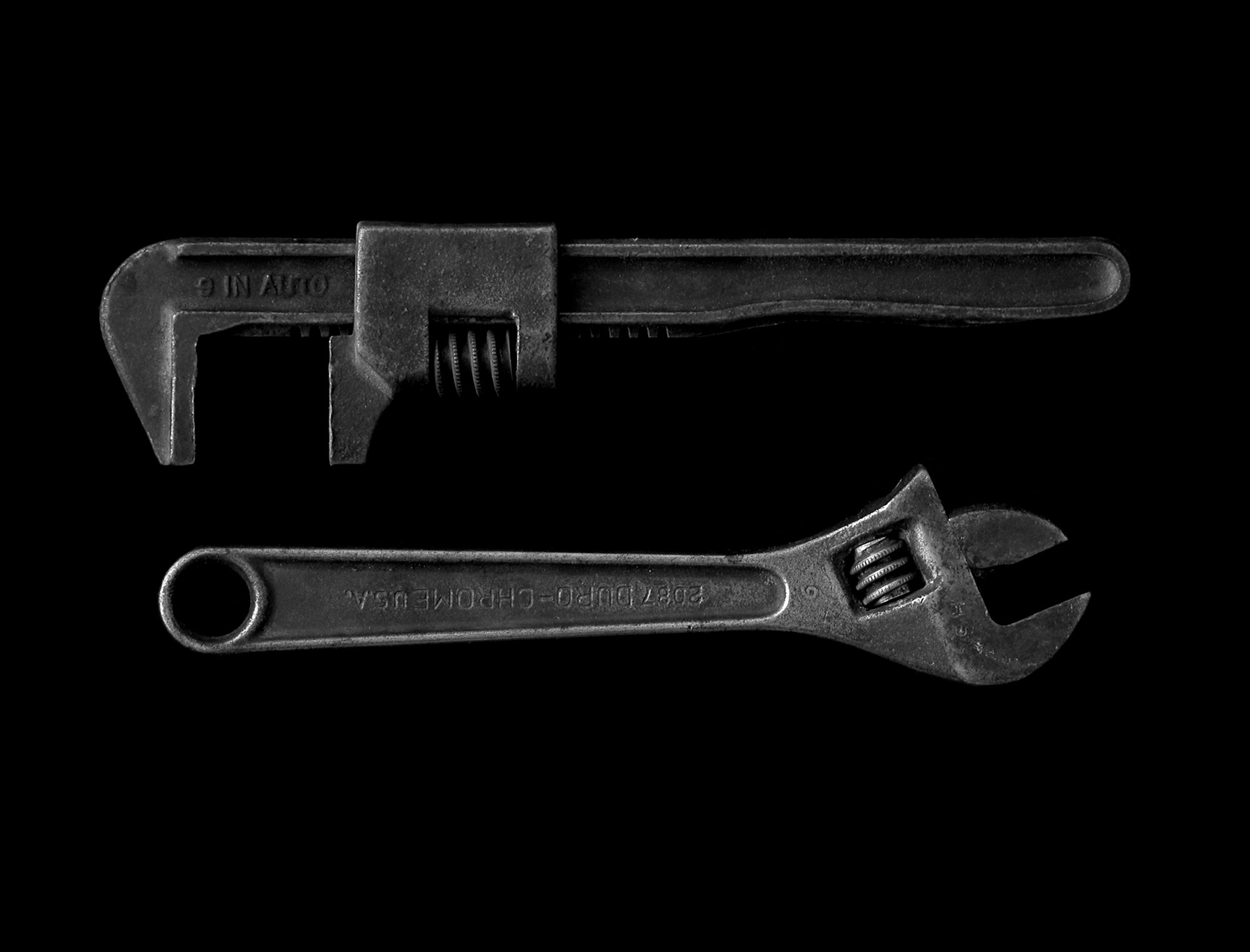 Wrenches on a black background