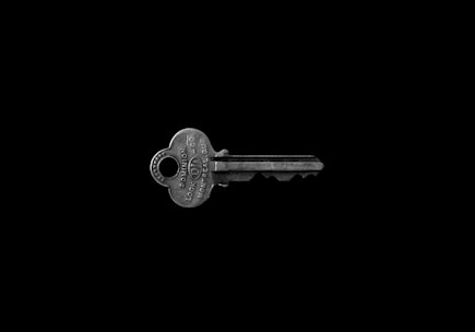 photo of key against black background